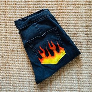fire painting on jeans